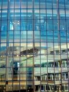 reflection of houses in the glass facade of the building, germany, cologne