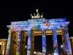 brandenburg gate in festival of lights at night