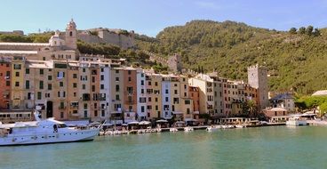 Boats on Sea in front of picturesque Houses on embankment, italy, liguria, porto venere