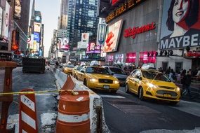 yellow taxis on the busy streets of new york