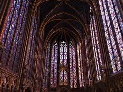 large stained glass windows in a church in france