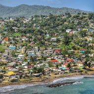 view of a tropical city with a beach