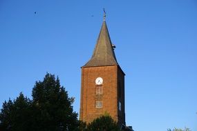 church clock tower with a spire