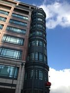 city ​​building in london against the cloudy sky