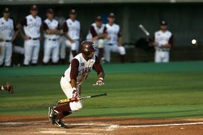 baseball player in a black helmet with a bat