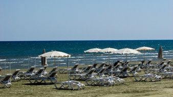 Sun loungers on a city beach in Larnaca, Cyprus