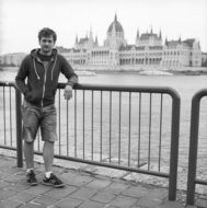 man on the waterfront in Budapest in black and white image