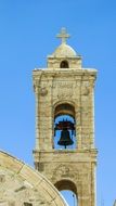 bell tower with cross in cyprus