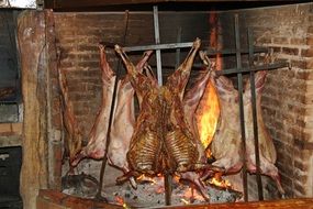 lamb on a fire in argentina