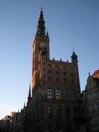 photo of the town hall with a bell tower in Poland