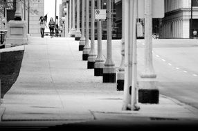 landscape of walking people on a street