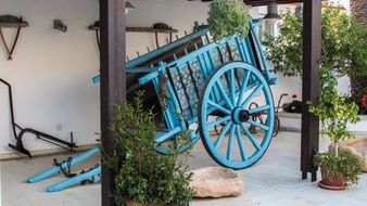 blue cart in front of the building in Cyprus