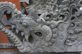 stone sculpture on the temple building