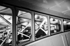 black and white photo of a bridge in london