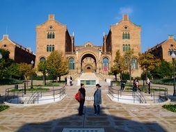 landscape of tourists in the square in front of the museum in barcelona