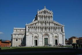 building in pisa under blue sky