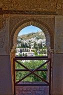 decorated arches of a building in Alhambra