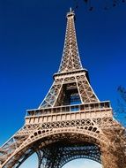 Eiffel Tower in Paris against the blue sky