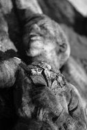 stone statue of a child as a symbol of revolution in Russia