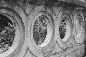 circles on the wall of a historic building
