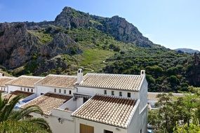 roofs of buildings on the background of mountains