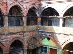 colorful ruins of old building with the arches