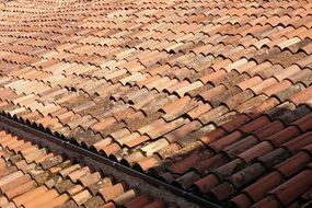 tiled roof under the bright sun close up