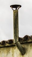 Zinc chimney with cap at roof