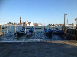blue Gondolas at pier, italy, Venice