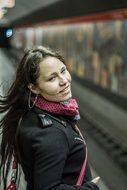 young woman in Subway station