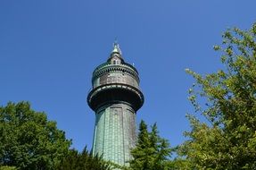 view of the tall green tower