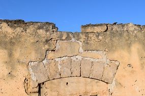 arch on the ruins of an old Mediterranean house