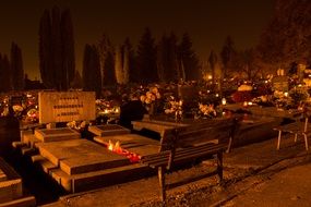 cemetery candles in the dark