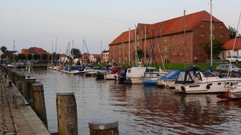 boats on Small River at pier in old town, germany