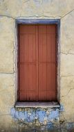 wooden window of an old house in lefkara