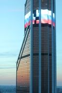 skyscraper of a new city with the colorful light reflections in Moscow