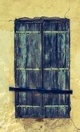 old weathered window of a house in xylotymbou
