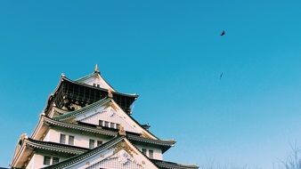 top of white traditional building at sky, Japan, Osaka