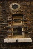 window on an old wooden building