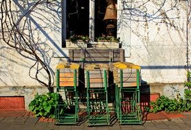 folded outdoor cafe chairs