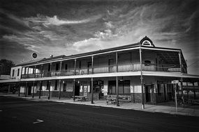 black and white photo of a hotel in Australia