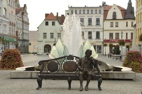Georg Philipp Telemann monument at fountain in town square, poland, Å»ary
