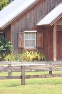 rural house near a green field
