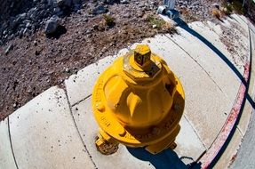 yellow hydrant on the street