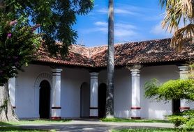 passage with columns in front of Old House