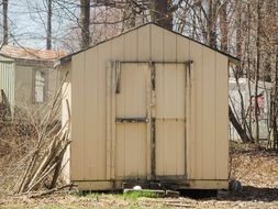 white wooden shed