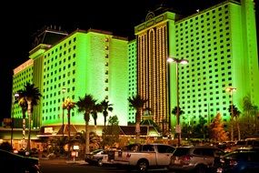 hotel with green walls at dusk