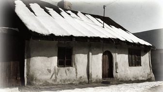 black and white photo of an old house