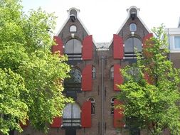 symmetry in the facade of a building in amsterdam