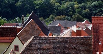 roofs on houses on a sunny day